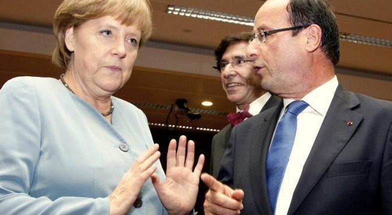 Олланд считает минские договоренности «большим облегчением для Европы», Меркель не спешит торжествовать